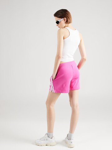 regular Pantaloni di Champion Authentic Athletic Apparel in rosa