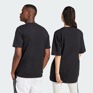 ADIDAS SPORTSWEAR - Camiseta funcional en negro
