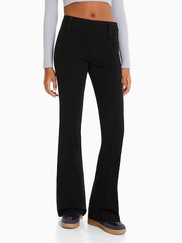 Bershka Boot cut Trousers in Black: front