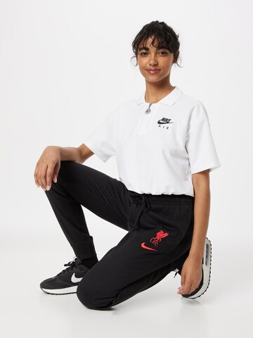 NIKE - Tapered Calças de desporto em preto