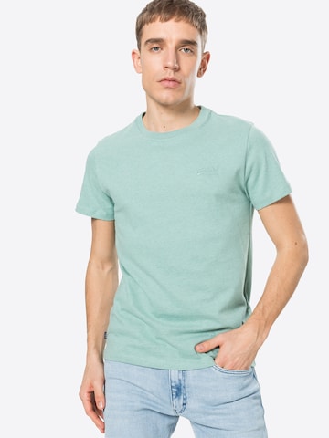 Superdry Zwężany krój Koszulka w kolorze zielony: przód