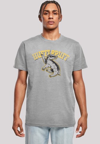 Maglietta 'Harry Potter Hufflepuff Sport Emblem' di F4NT4STIC in grigio: frontale