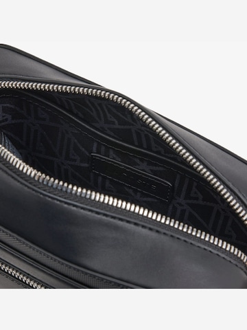 LACOSTE Crossbody bag 'Lacoste Petit sac messenger Homme Langon Petit Piqué Noir' in Black