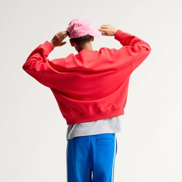 ADIDAS ORIGINALS - Sweatshirt 'AdiSignature NY' em vermelho