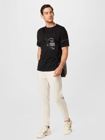 Calvin Klein Zwężany krój Spodnie w kolorze beżowy