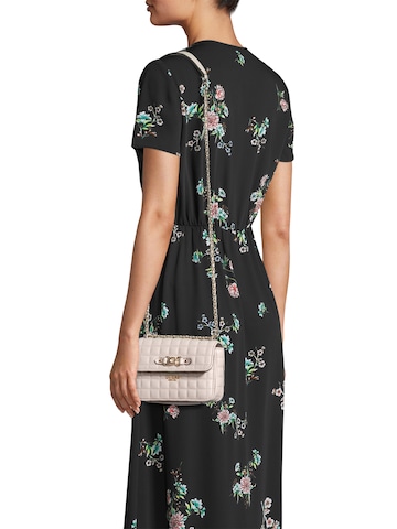 GUESS Schoudertas 'NADIRA MINI CNVRTBL XBODY FLAP' in Grijs