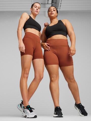 PUMA Skinny Workout Pants in Brown: front