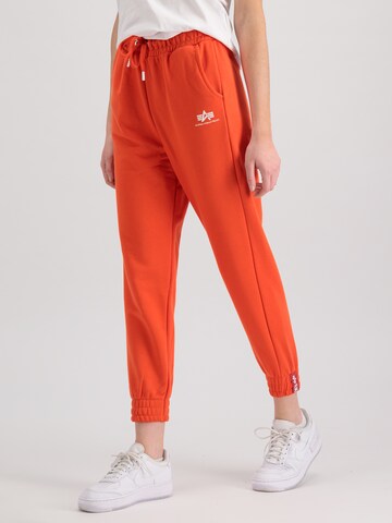 Effilé Pantalon ALPHA INDUSTRIES en rouge : devant