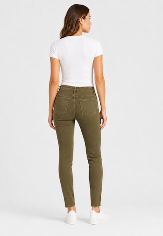 Slimfit Jeans di Elara in verde