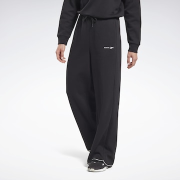 ReebokLoosefit Sportske hlače - crna boja: prednji dio