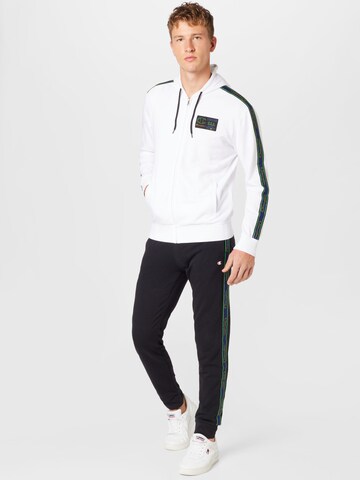 Champion Authentic Athletic Apparel Sweatsuit in Black: front