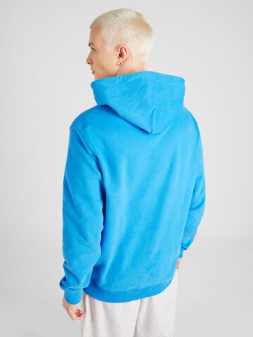Tommy Jeans Bluzka sportowa 'ESNTL' w kolorze niebieski