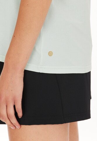 Athlecia Sports top 'Mota' in Green