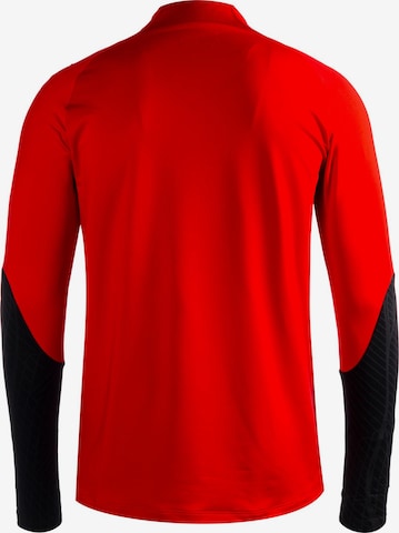 T-Shirt fonctionnel 'Strike 23' NIKE en rouge