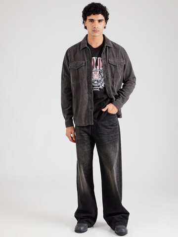 T-Shirt 'VARSITY TIGER' Tommy Jeans en noir