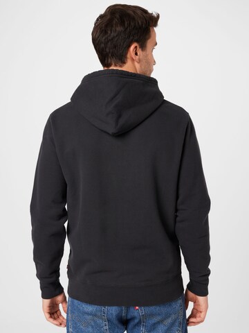 LEVI'S ® Sweatshirt 'Standard Graphic Hoodie' in Schwarz