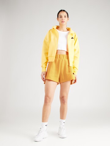 ADIDAS SPORTSWEAR Loose fit Sports trousers 'Z.N.E.' in Yellow