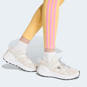 ADIDAS SPORTSWEAR Skinny Workout Pants 'Essentials' in Yellow