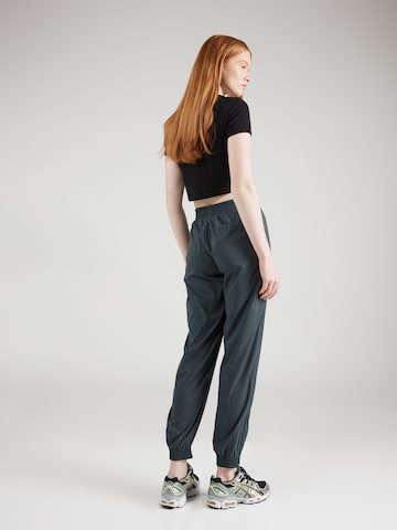 Girlfriend Collective Tapered Sportbroek 'Summit Track' in Groen