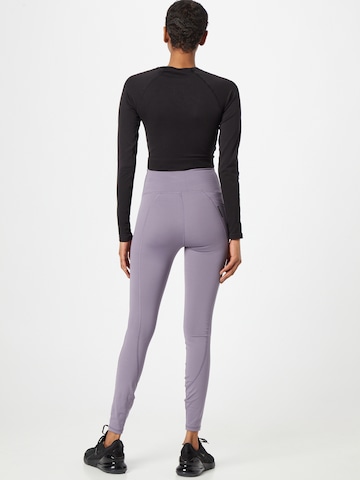 UNDER ARMOUR Skinny Sporthose in Lila