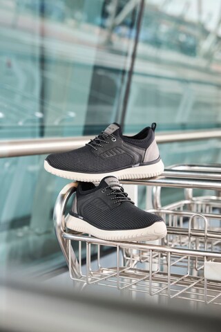 Rieker Slip on in Schwarz