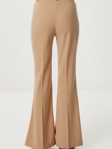 Happiness İstanbul Flared Pressveckad byxa i beige