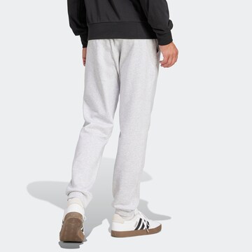 ADIDAS SPORTSWEAR - Tapered Pantalón deportivo 'FEELCOZY' en gris