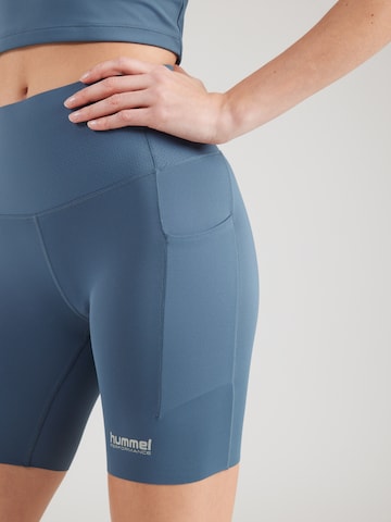 Skinny Pantalon de sport 'Hiit Intensity' Hummel en bleu
