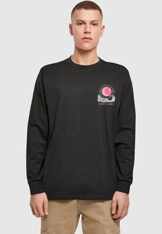 T-Shirt 'Sunset Charm' Merchcode en noir : devant