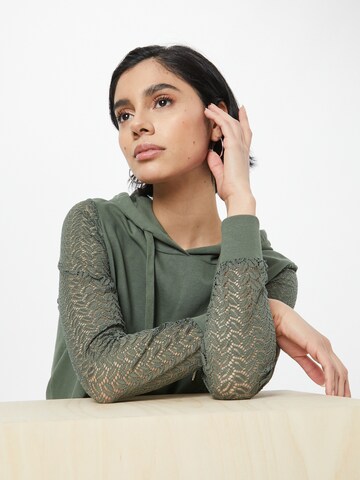 ABOUT YOU Sweatshirt 'Svenja' in Green