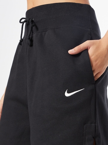 Nike Sportswear Loose fit Trousers 'Phoenix fleece' in Black