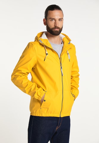 Schmuddelwedda Between-Season Jacket in Yellow: front