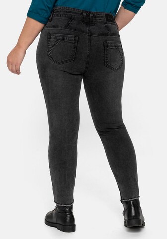 Skinny Jeans di SHEEGO in nero