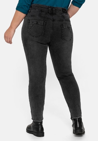 Skinny Jeans di SHEEGO in nero