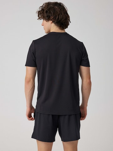 SNOCKS Funktionsshirt in Schwarz