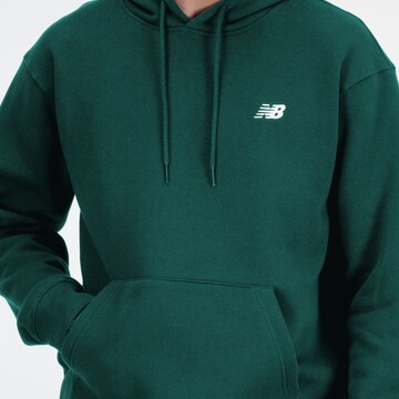 Sweat-shirt 'Essentials' new balance en vert