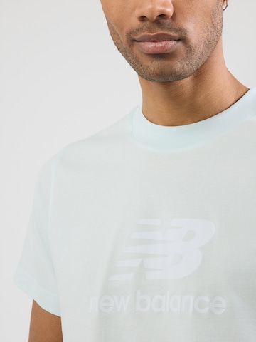 new balance Koszulka w kolorze niebieski
