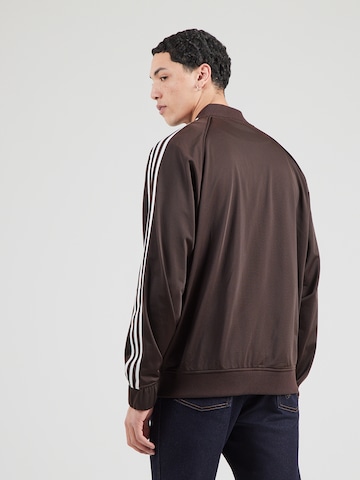 ADIDAS ORIGINALS Prehodna jakna 'BRITCORE' | rjava barva