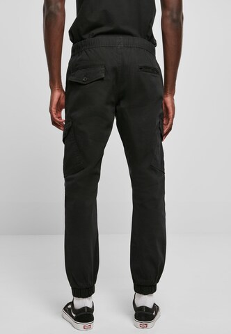 Tapered Pantaloni cargo di SOUTHPOLE in nero