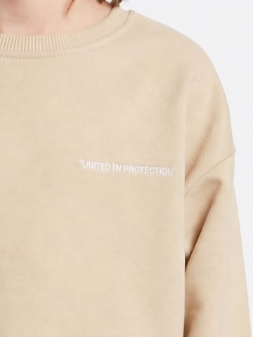 GrimelangeOdjeća za vježbanje 'GRIMELANGE Rundhals-Sweatshirt-Hosen-Set' - bež boja