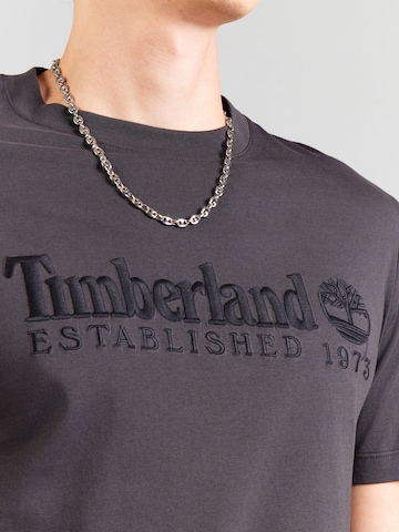 TIMBERLAND Majica 'ESTABLISHED 1973' | črna barva