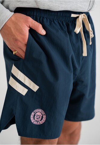 Regular Pantalon Prohibited en bleu