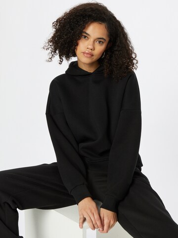 ABOUT YOU x INNA Sweatshirt 'Alessia' i svart: forside