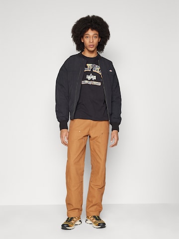 ALPHA INDUSTRIES Tričko 'College' - Čierna