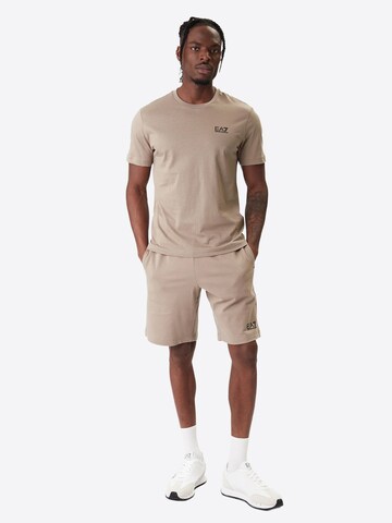 Maglietta 'T-shirt EA7 da Uomo - nero 8NPT250208 NEROORO' di EA7 Emporio Armani in beige