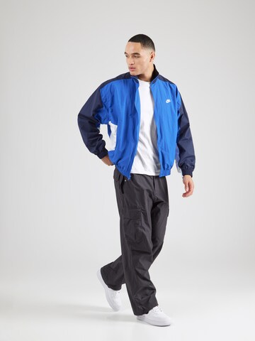 Veste mi-saison 'CLUB' Nike Sportswear en bleu