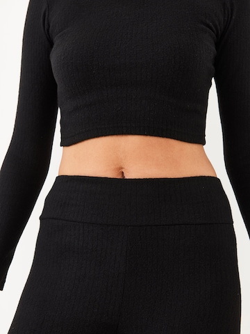 Pantalons de tailleur Bianco Lucci en noir