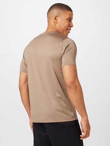 new balance Sportshirt 'Tenacity' in Braun