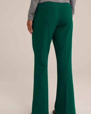 Flared Pantaloni di WE Fashion in verde