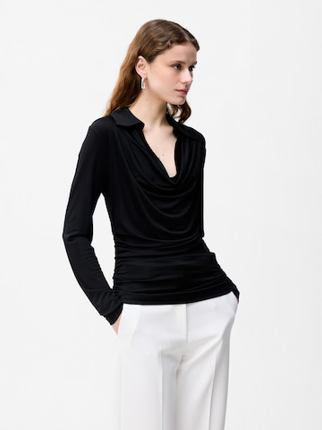adl Bluse‌‌‌ in Schwarz